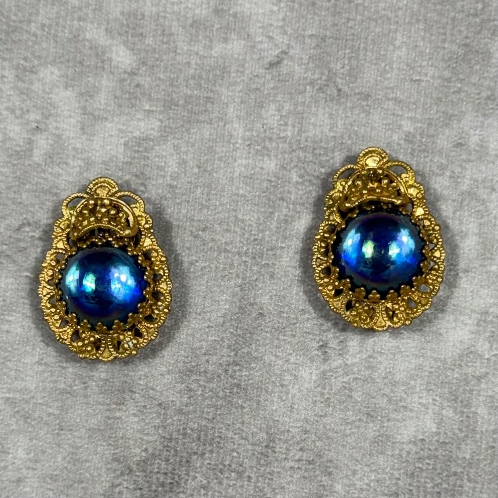 Vtg West Germany Clip On Earrings Blue Iridescent Glass Cabochon Gold Filigree